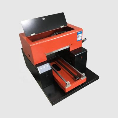 China Advertising company GNFEI printing machine UV A4 UV printer file multi-function printing for plastic metal stone leather glass wood acrylic etc.. for sale