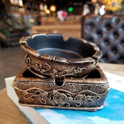 China Universal Creative Home Rustic Bar Desktop Decoration Living Room Resin Ashtray Portable Ashtray for sale