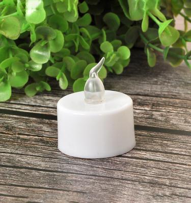 China Tea Light Flameless Candles Warm White Flickering Mini LED Tea Light Battery Operated Flameless Candles for sale