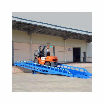 China Hotels Top Selling Guaranteed Quality Loading And Unloading From Platform Warehouse Dedicated Movable Dock Ramp for sale