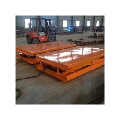 China Hotels Stationary Scissor Lift Platform Used For Loading And Unloading Materials In Factory Warehouses for sale