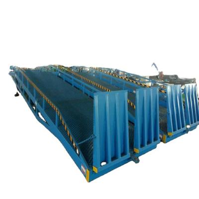 China New Product 6-15 Ton Hydraulic Loading Ramp Hotels Container Unloading Platform For Forklift for sale