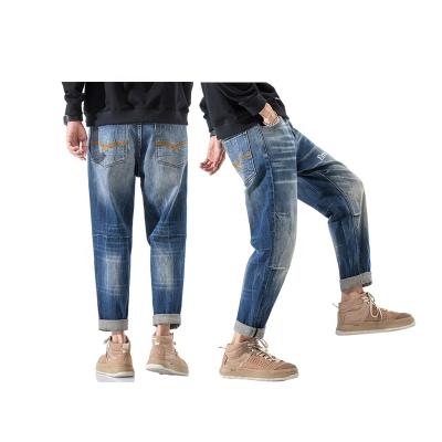 China High Quality Breathable Vintage Jeans Men Ripped Denim Pants Zip Off Cargo Pants Popular Hip Hop Logo Pants Joggers Set Black Denim for sale