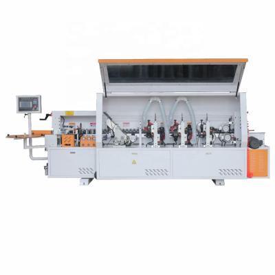 China Furniture cabinet edging machine /automatic trimming edge trimming machine for sale