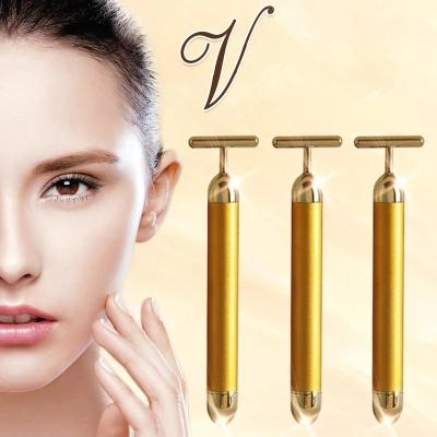 China Skin Rejuvenation 24k Gold Face Lift Bar Roller Vibration Slimming Massager Facial Stick Beauty Skin Care Vibrating T Shaped Tool for sale