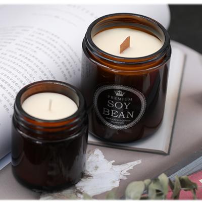 China Classic Wholesale Candle Ships Tawny Jar Jar Round Amber Glass Candle Containers With Lids for sale