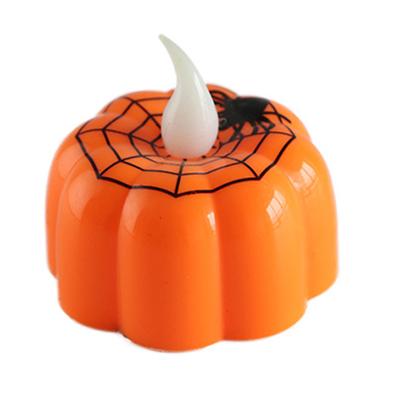 China Eco-friendly Flameless Pumpkin Tea Light Candles Halloween Holiday Decorations Led Electronic Light Candles for sale