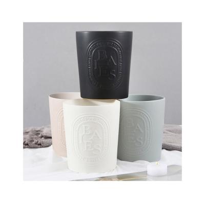 China Wholesale Custom Home Decor Matte Candle Ships Embossed Empty Candle Container Black Ceramic Candle Jar for sale