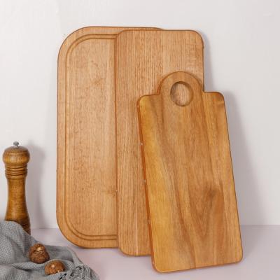 China Disposable wooden cutting board for kitchen leather chopper with handle for sale