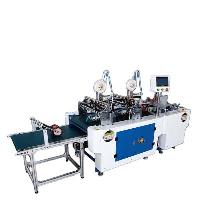 China Automatic Food Double Sided Tape Sticking Machine for sale