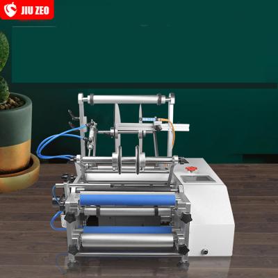 China 2020 Low Price Manual Semi Automatic Round Wine Bottle Adhesive Labeling Machine Fast Food for sale