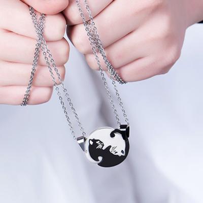 China Black And White Simple Border Romantic Stainless Steel Jewelry Titanium Steel Anniversary Gift Cat Embrace Splicing Couples Pendant Chain for sale