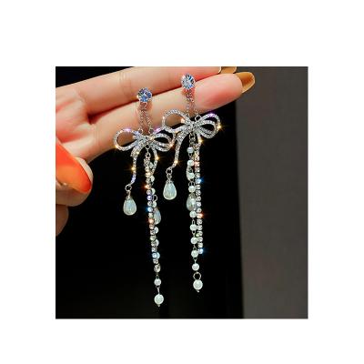 China 2021 hyperbole factory outlet bow earrings woman for night club style rhinestone exaggeration earrings for sale