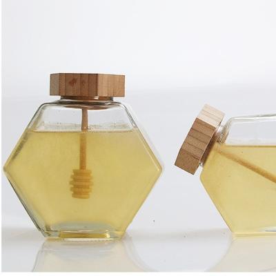 China High Quality 100ml 220ml 380ml Hexagonal Transparent Clear Glass Honey Jar Glass Storage Bottle With Bamboo Lid for sale