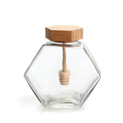 China Wholesale 100ML 220ML 380ML 500G Food Container Storage Bottle Glass Honey Jar With Wood Dipper Lid for sale