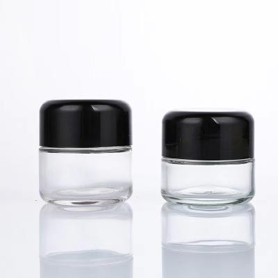 China 2 oz 3 oz 4 oz 6 ozairtight clear child resistant glass jar flower jar packaging containers with CR Cap for sale