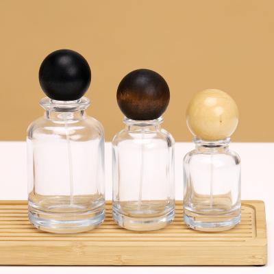 China Creative High Quality Empty Luxury 30ml 50ml 100ml Round Glass Perfume Bottle with Box Perfume Atomizer Spray Bottle for sale