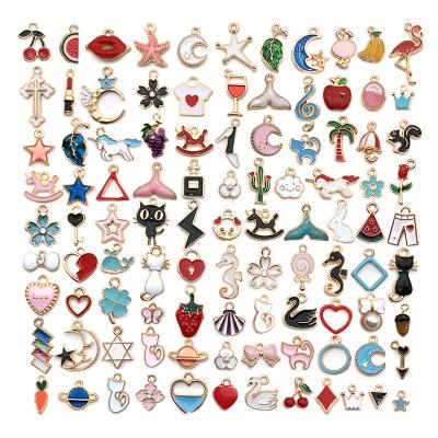 China Punk 100 Pieces Mixed Alloy Oil Drip Color Pattern Pendants Jewelry Accessories Small Handwork Art Pendants For DIY Production for sale