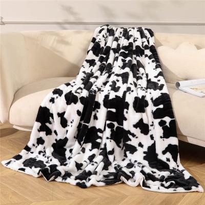 China Folded Black White Cow Print Bed Blanket Flannel Fleece Throw Blankets for sale