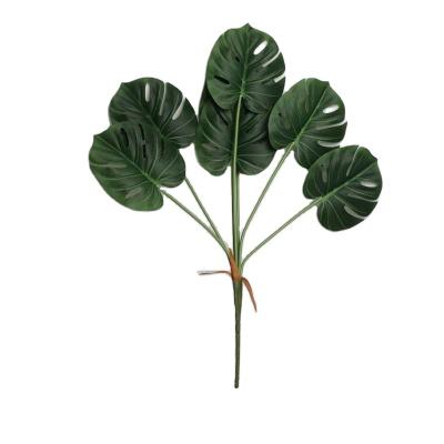 China Hot Sale Environmentally Friendly Monstera Leaves 7 Heads Artificial Faux Green Turtle Leaves For Decoration for sale