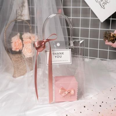 China Recyclable Clear Transparent PVC Christmas Thanksgiving Organizer Bags Gift Packaging Bag Tote Gift Bag Shopping Jelly With Handles Boxes for sale