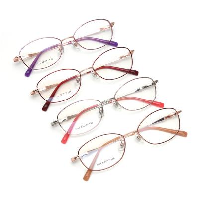 China Titanium Optical Frames 1111 Super Light Titanium Optical Glass Eyewear Frame Glasses Wholesale Hot Sales Latest Retro Fashion For Women for sale