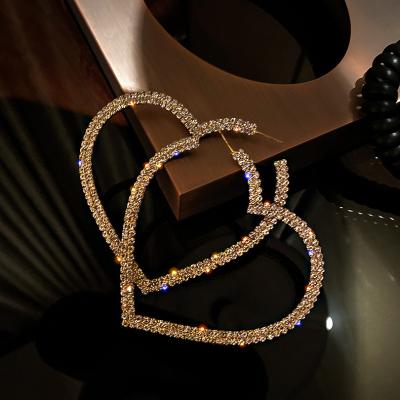 China Best Selling Environmental Friendly S925 Sterling Silver Needle Heart Statement Earrings 18K Gold Plated Big Rhinestone Crystal Love Heart Earrings for sale