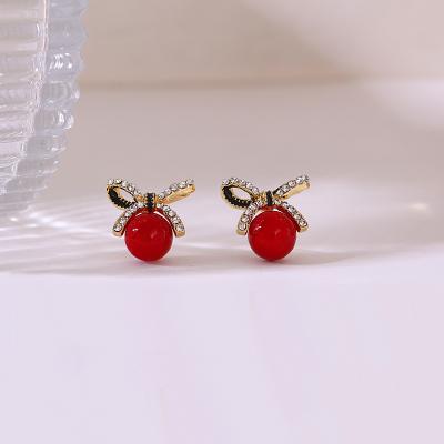 China High Quality Environmentally Friendly Vintage Pearl Bow Knot Stud Earrings Christmas Red Drop Earrings For Women for sale