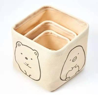 China New Design Portable Goods Tending 10 Ann Canvas Silk Screen Custom Logo Portable Beige Desktop Storage Baskets for sale