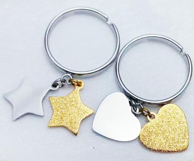 China European and American fashion stainless steel star stainless steel environmental friendly gold frosted single earrings love earrings for sale