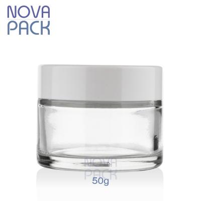 China Shoulder Cosmetic Glass Jars Bottles And Jars 30ml 50ml Skin Care Packaging Cosmetic Facial Cream Flat Clear Glass Containers 50g for sale