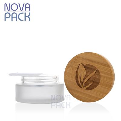 China Cosmetic Packaging 15g 30g 50g 100g 100ml Cap Skin Care Body Bamboo Butter Lotion Cosmetic Glass Container Frosted Cream Jars With Lid for sale