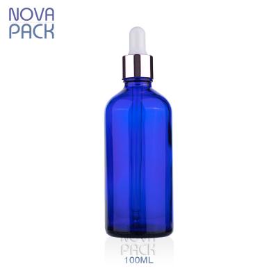 China 100ml Cobalt Blue Body Oil Cosmetic Glass Bottle Round Hair Oil Dropper Bottles Personal Care Cosmetic Colored Glass Bottle With Dropper for sale