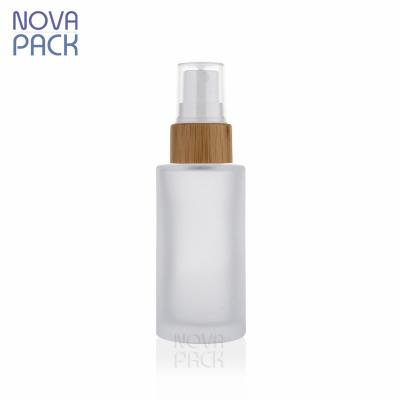 China Cosmetic bamboo cosmetic packaging 30ml 40ml 50ml 60ml 80ml 100ml frosted glass bottle bamboo spray toner bottle with bamboo mist sprayer for sale