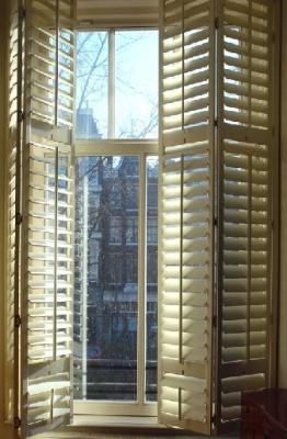 China indoor 100% basswood folding shutters for windows and doors with frame and rail for sale