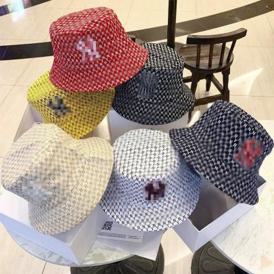 China Designer Bucket Hats Unisex Checked Print Double-Side-Wear Hot Selling Printed Reversible Bucket Hat for sale