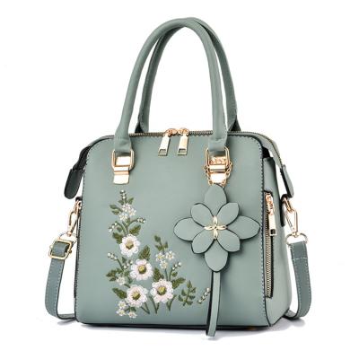 China 2022 High Quality Fashion Cute Large Shoulder Ladies Blue Floral Embroidery Designs Leather Women Handbags for sale