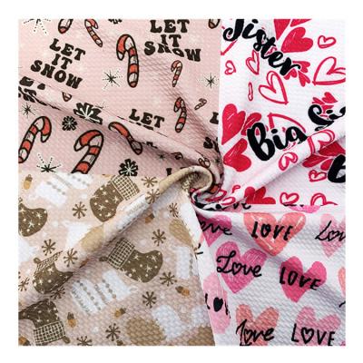 China Super Soft Memory Polyester Spandex Fabric For Bows Ball Cloth Custom Christmas Designs Ready To Ship for sale