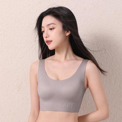 China QUICK DRY Women Top Sell Lingerie Padded Sleep Top Vest Solid Traceless Laser Cut Wireless Seamless Sleep Bra for sale