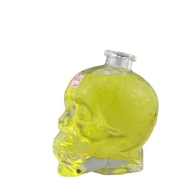 China Wholesale Custom Wine Glass Bottle Skull Shape Glass Wine Bottle For Whiskey 250ml for sale