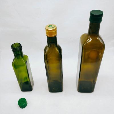 China Square shape green color cooking oil glass bottle manufacturer 500ml cooking oil glass bottle with screw cap for sale