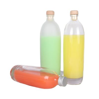 China Beverage Glass Beverage Bottle With Cork Cap Glass Bottles For Juice Water for sale