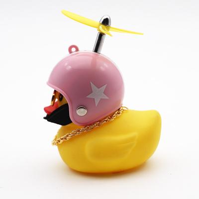 China Cute Pilot Ornament/New Cartoon Trend Swinging Booster Yellow Military Helmet Light Duck Rubber Duck For Car Hanging Ornament for sale