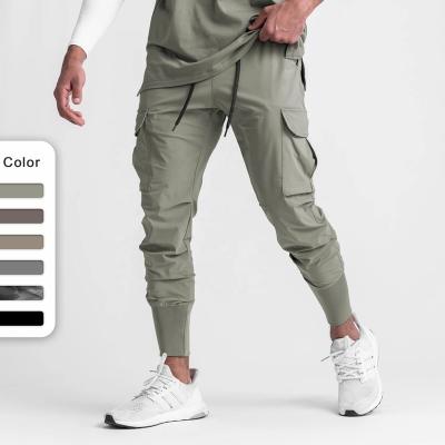 China Anti-Static Muscle Sports Mens Loose Woven Gym Fitness Jogger Running Training Pants New for sale