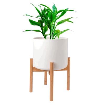 China Viable Indoors and Outdoors Simple Modern Wooden Home Decor Plant Pot Holder Wholesale Mid Century Plant Stand Bamboo for sale