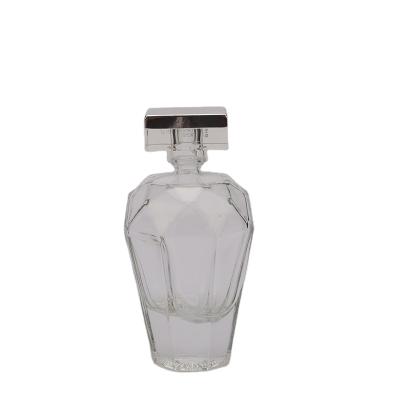 China New 100ml Crystal Unique Shape Lxury Recyclable Bulk Packaging Empty Recyclable Glass Perfume Bottle With Pump Sprayer for sale