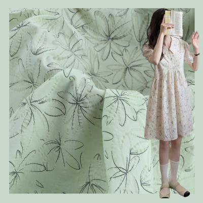 China 100 Comb Cotton Bubble Plain Organic High End Salt Shrink Floral Print Dresses Fabrics for sale