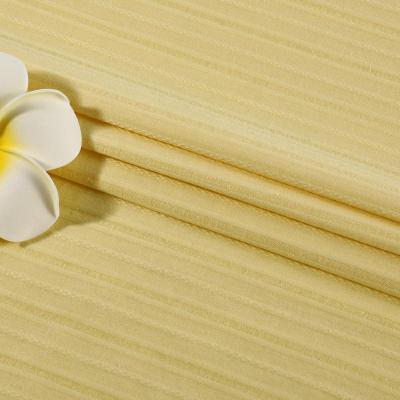 China Organic Cheap Pure Yellow Striped Jacquard Cotton Shirting Fabric Manufacturer for sale