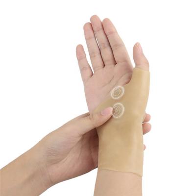 China Waterproof Elastic Wrist Brace Gel Silicone Therapy Silicone Wrist Arthritis Pressure Corrector Massage Gloves for sale