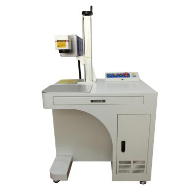 China Best Price Fiber Laser UV CO2 Laser Marking Machine For Wood Plastic Wood Plastic Mark Printer OV Laser Marking Machine for sale